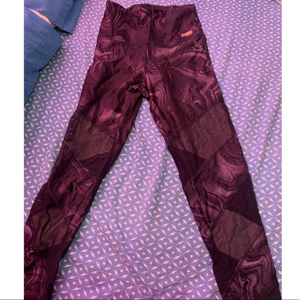 Pink mesh active wear leggings.